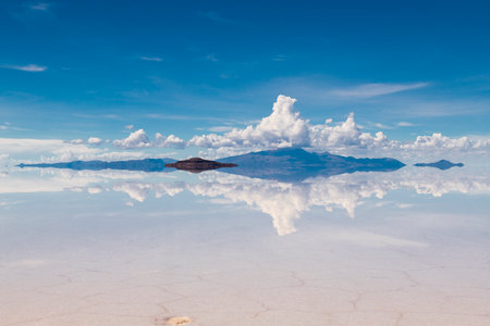 Reflection of island on uyuni salt flat
