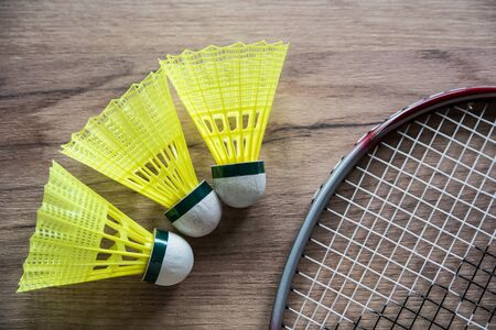 badminton racket with yellow ballsの写真素材