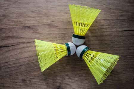 badminton racket with yellow ballsの写真素材