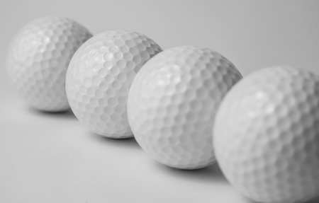 golf club and ball on white backgroundの写真素材