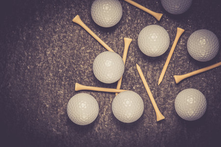 golf balls star on vintage stone backgroundの写真素材