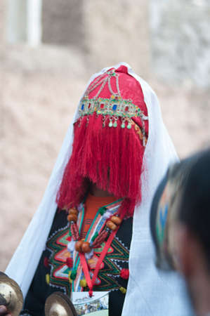 Dcheira Inezgane / Morocco - September 1, 2019: disguised people not identified at the BILMAWN Carnival. BILMAWN Carnival is a popular annual festival, known worldwide for its elaborate masks.のeditorial素材