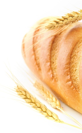 Bread and wheat isolated on whiteの写真素材