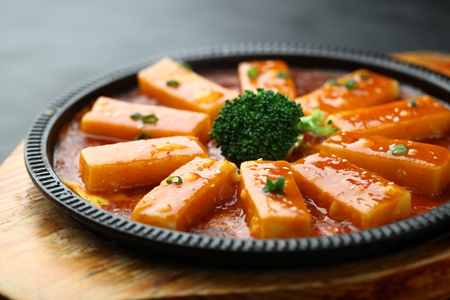 Chinese cuisine served on sizzling plateの写真素材