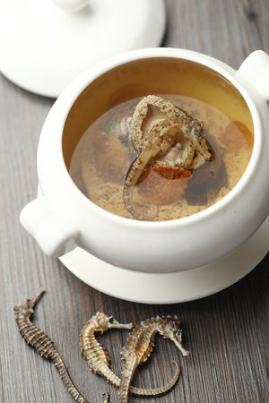 Sea horse soup served in a bowlの写真素材