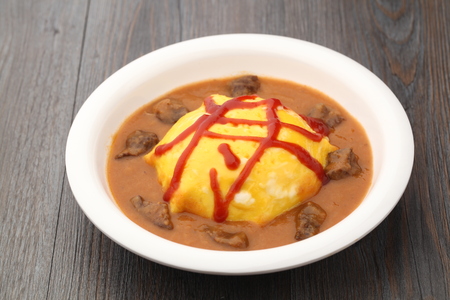 Omelette with meat curryの写真素材