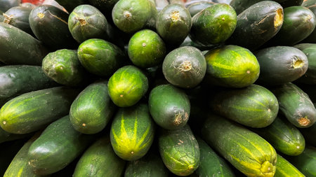 Cucumbers background in the supermarket