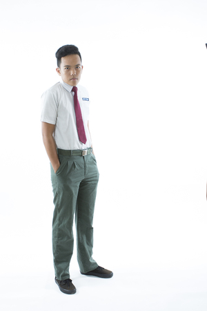Malaysian secondary school boy  isolated on white backgroundの写真素材