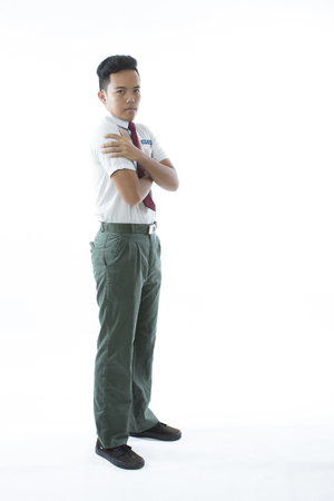 Malaysian secondary school boy  isolated on white backgroundの写真素材