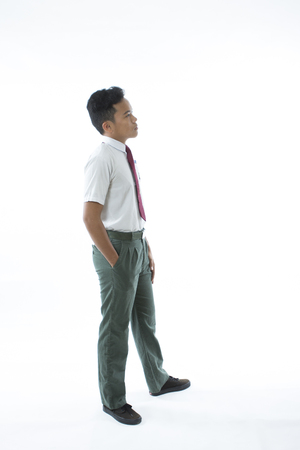 Malaysian secondary school boy  isolated on white backgroundの写真素材