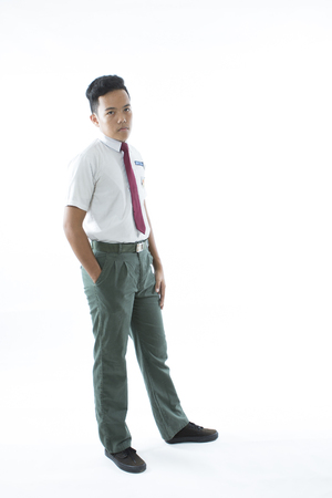 Malaysian secondary school boy  isolated on white backgroundの写真素材