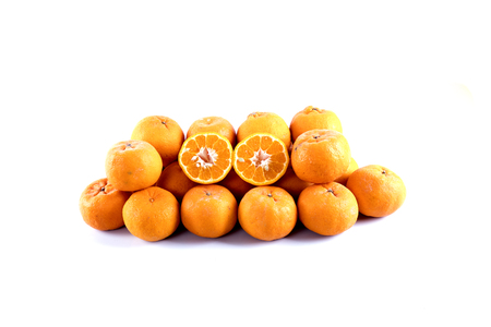 Isolated orange mandarin that is synonymous with the Chinese New Year celebration in the white backgroundの写真素材