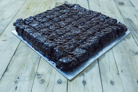 Brownies cake home made on the wooden table,visible noiseの写真素材