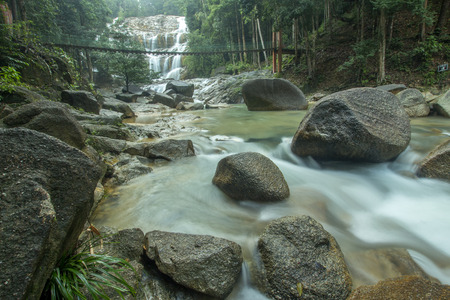 The scenery in the waterfall area in the tropical rainforest in Kuantan, Pahang, Malaysia.visible water secretion and noiseの写真素材