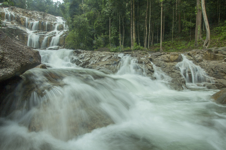 The scenery in the waterfall area in the tropical rainforest in Kuantan, Pahang, Malaysia.visible water secretion and noiseの写真素材