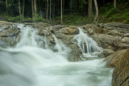 The scenery in the waterfall area in the tropical rainforest in Kuantan, Pahang, Malaysia.visible water secretion and noiseの写真素材