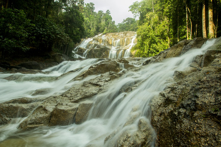 The scenery in the waterfall area in the tropical rainforest in Kuantan, Pahang, Malaysia.visible water secretion and noiseの写真素材