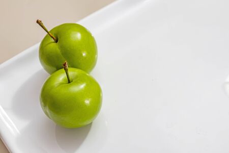 close up green plumsの写真素材