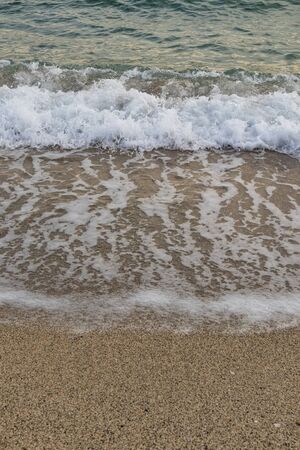 beach and waves on sea