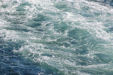 turquoise color sea and ship wave in the sea