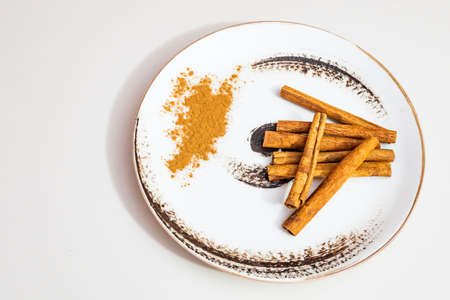 istanbul,turkey-june 16,2020.crusted and powdered cinnamon on a decorative plate.
