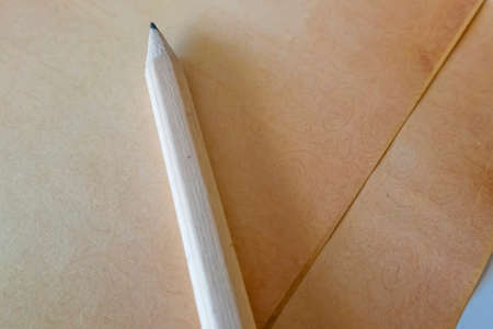 close up pencil and note paper on background