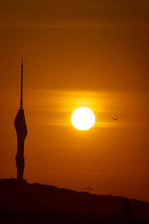 sunrise and camlica tower silhouette in istanbul