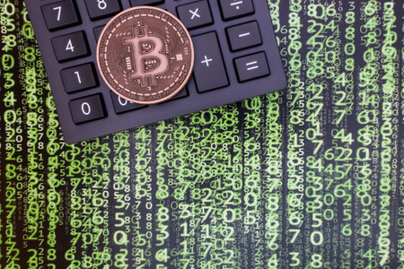 istanbul, turkey-may 21,2021.cryptocurrency mining and bitcoin coin for finance and economy with calculator.のeditorial素材