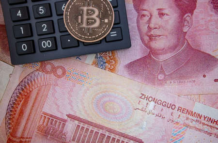 istanbul, turkey-may 21,2021.cryptocurrency mining and bitcoin coin for finance and economy with calculator.のeditorial素材