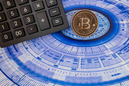 istanbul, turkey-may 21,2021.cryptocurrency mining and bitcoin coin for finance and economy with calculator.のeditorial素材