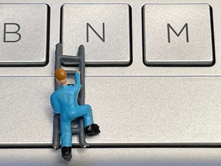 IT and computer world and miniature working people.の写真素材