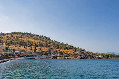Kusadasi,Aydin,Turkey- July 25,2021.Kusadasi, one of the important tourism resorts of Turkey. The view from the old city and the town center with its historical and natural beauties in summer.のeditorial素材