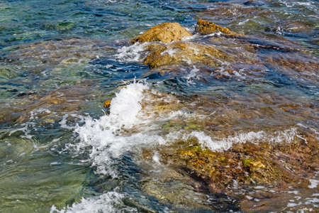 clear and blue waters of the aegean sea for tourists who love vacation and sea in summer