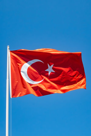 blue sky and waving turkish flagの写真素材