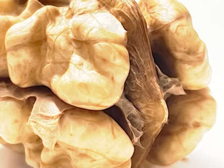 close up ready to eat unshelled walnuts