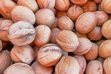 close up shelled walnuts in market stallの写真素材