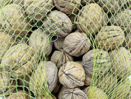 shelled walnuts in a net