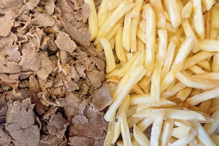 Close up Turkish doner kebab with french fries