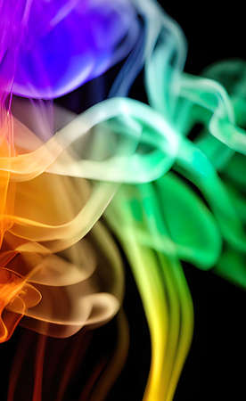 abstract colorful smoke on black backgroundの写真素材