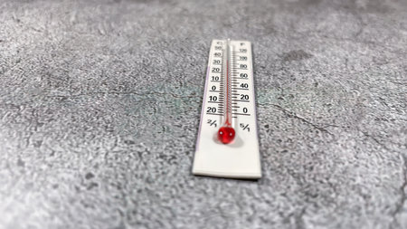thermometer on the gray backgroundの写真素材