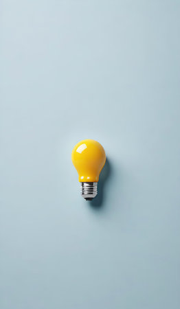Yellow light bulb on blue background. Minimal creative idea concept.の素材