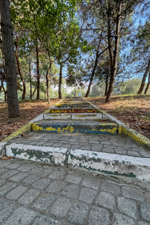 Old stairs in the park in the city