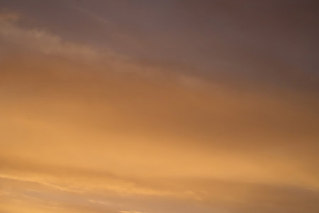 Sunset sky with clouds. Nature background. Orange sunset sky.の写真素材