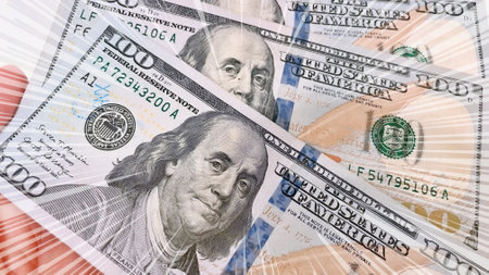 A Fan of $100 Bills.A close-up photo of a fan of $100 US dollar bills. The bills are arranged...