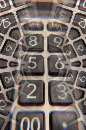 Abstract Financial Numbers Background. Adistorted, view of calculator keys. A powerful visual...