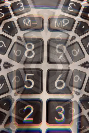 Abstract Financial Numbers Background. Adistorted, view of calculator keys. A powerful visual concept for finance, economy, data, and complex mathematical calculations.の写真素材