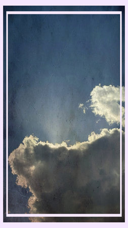 clouds in the blue sky with grunge textured paper background