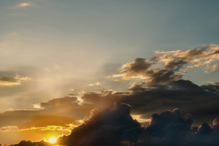 Cloudscape, Colored Clouds at Sunset near the Ocean with a Golden Light