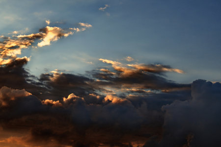Cloudscape, Colored Clouds at Sunset near the Ocean as a Background