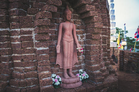 Buddha statue ancient holy temple in Thailand.の写真素材